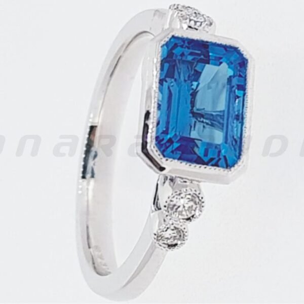 Diamond / Blue Topaz Ring