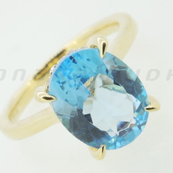 Diamond / Blue Topaz Ring
