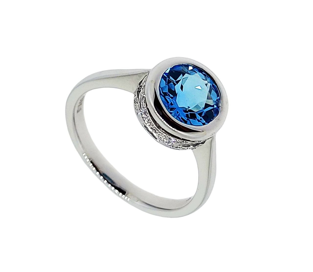 Diamond / Blue Topaz Ring